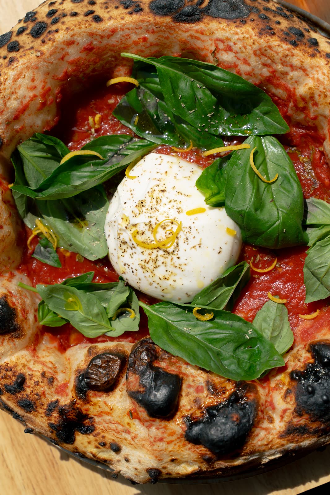 Pizza with burrata and basil