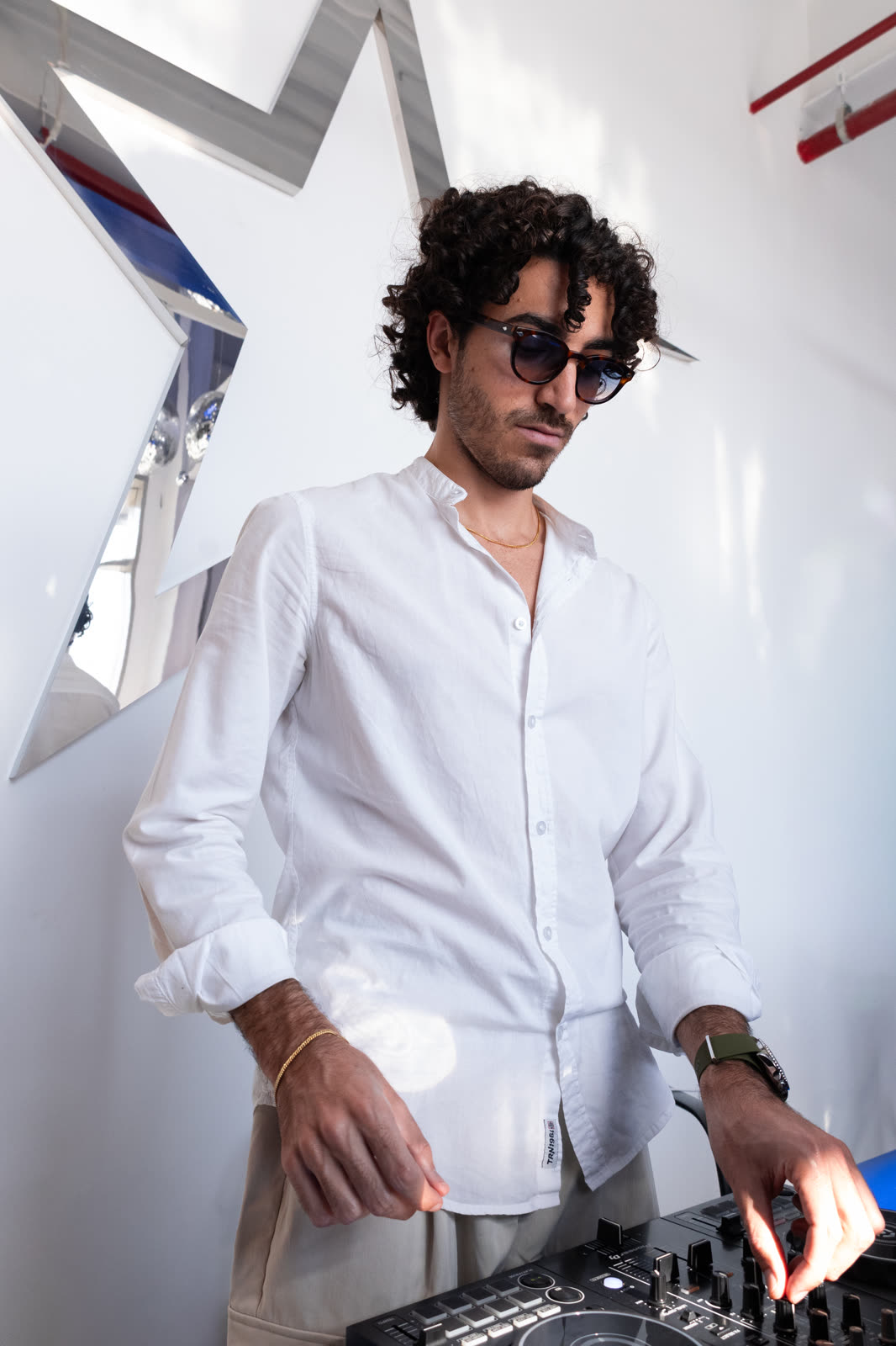 DJ in white at the opening
